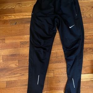 Men's Nike running pants, size M